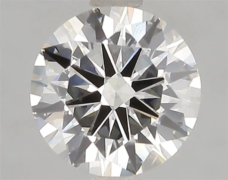 A close-up image of a round lab-grown diamond with a clear appearance and polished surface.