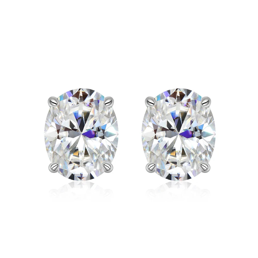 Pair of diamond stud earrings on a white background
