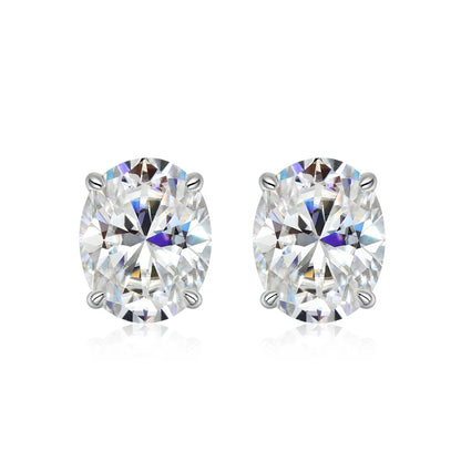 Pair of diamond stud earrings on a white background