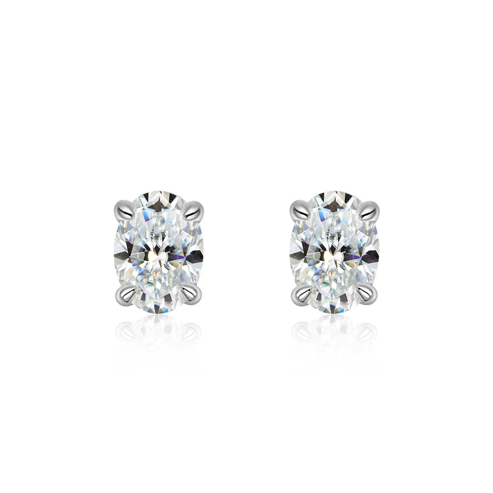 Pair of diamond stud earrings on a white background