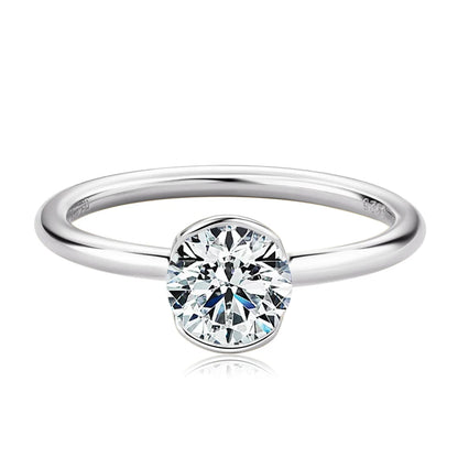 Silver ring with a diamond on a white background