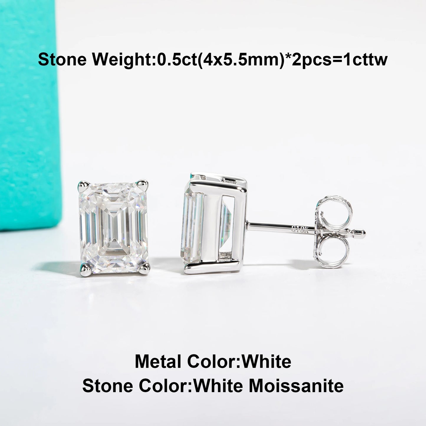 Pair of silver emerald-cut moissanite earrings on a white background with text indicating stone weight and color.