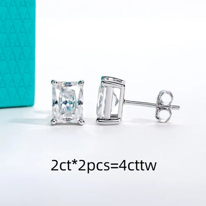 Pair of diamond stud earrings with a turquoise box in the background