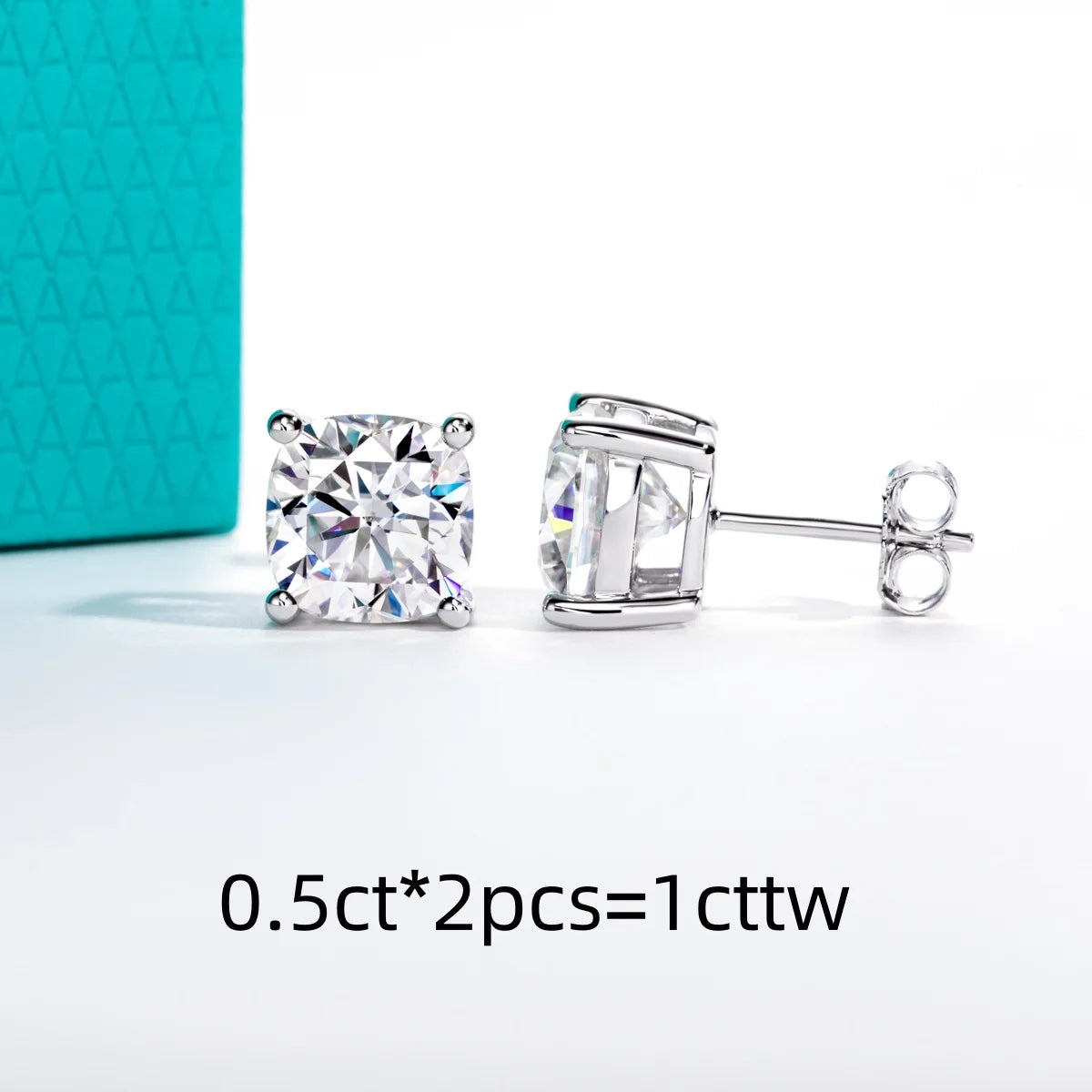 Pair of silver stud earrings with clear gemstones on a white background