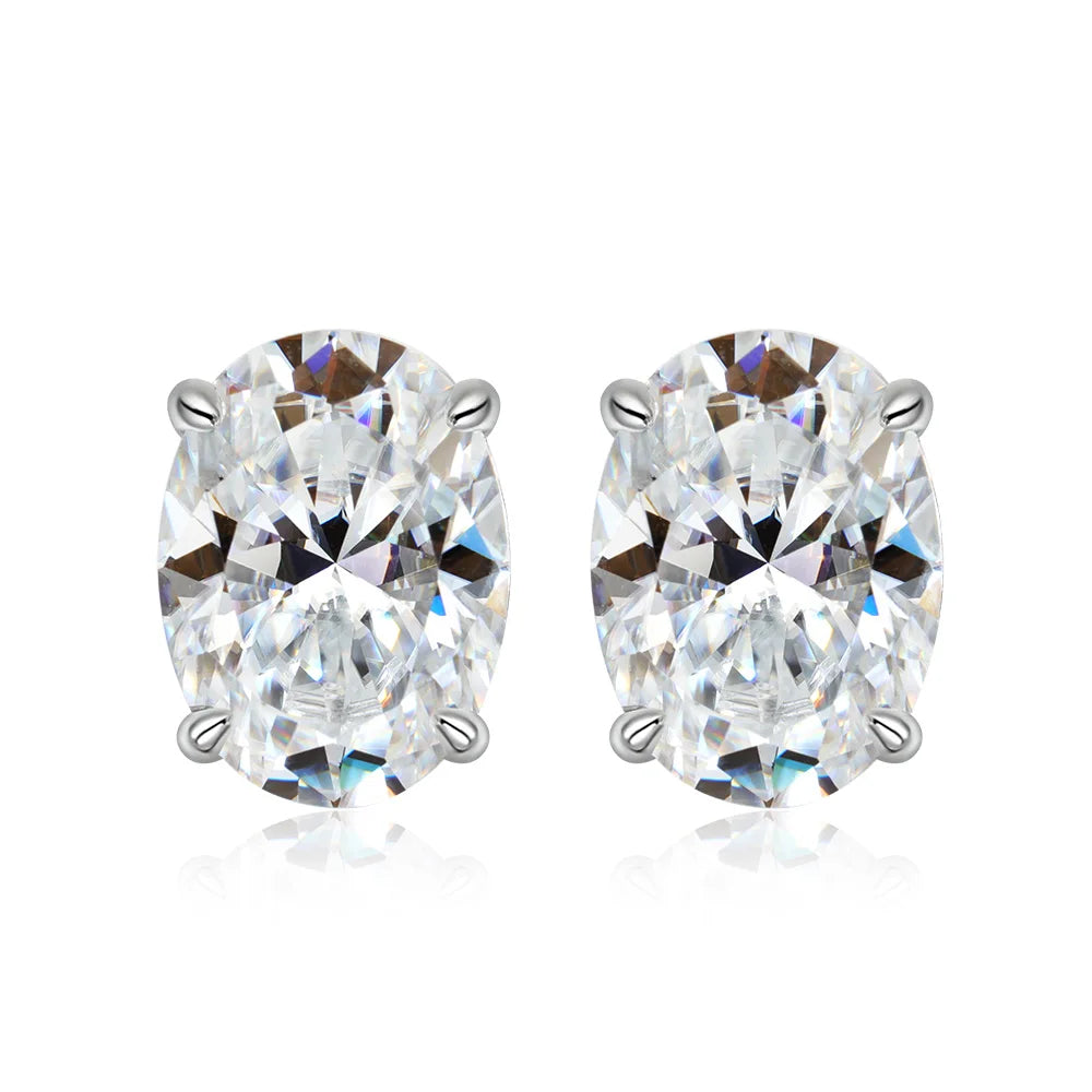 Pair of diamond stud earrings on a white background