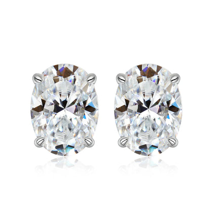 Pair of diamond stud earrings on a white background