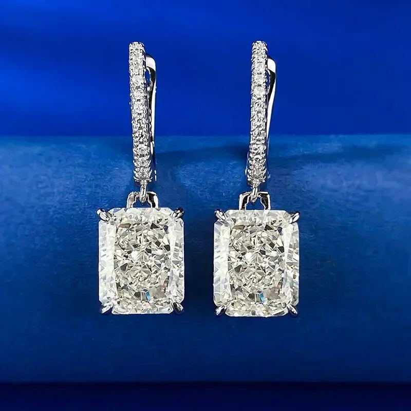 Diamond earrings on a blue background