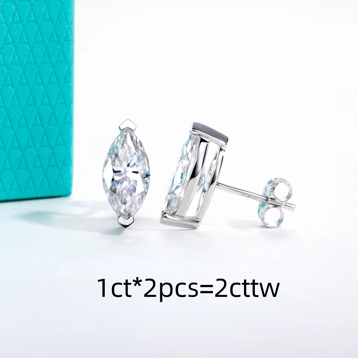 Pair of silver stud earrings with clear gemstones on a white background.