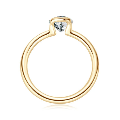 Gold ring with a diamond on a white background