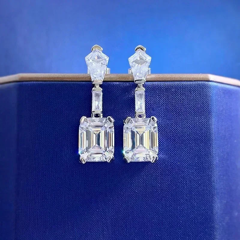 Diamond earrings on a blue background