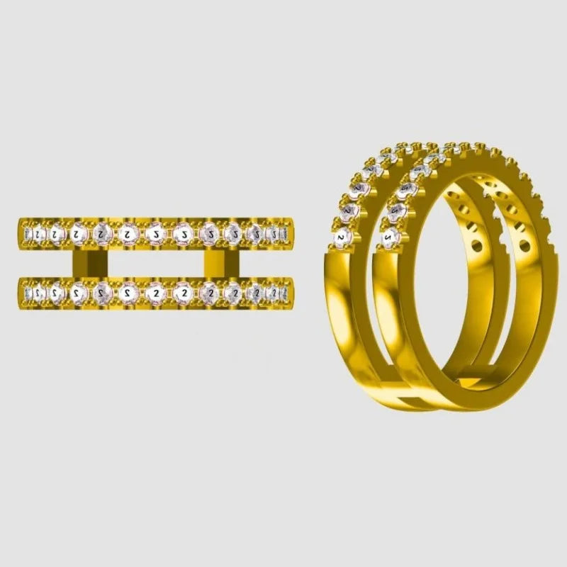 Two gold rings with diamond accents on a light gray background