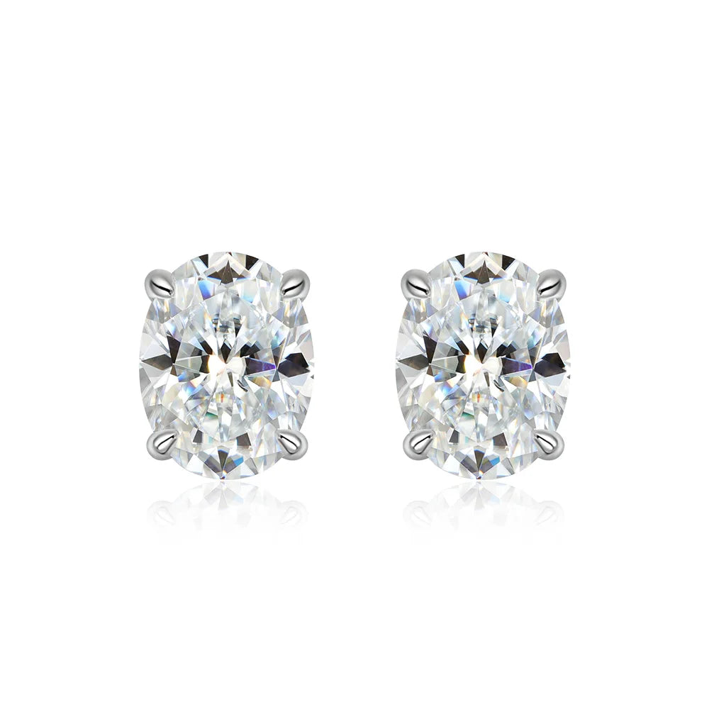 Pair of diamond stud earrings on a white background