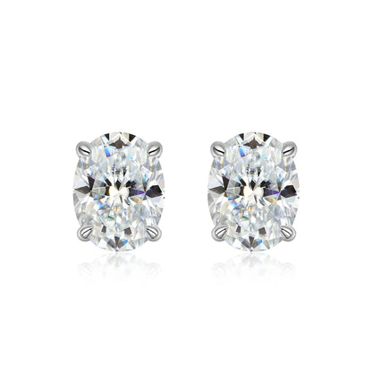 Pair of diamond stud earrings on a white background