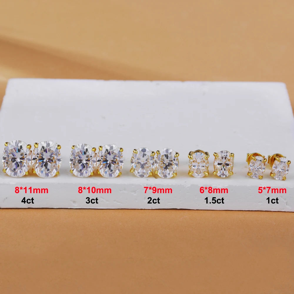 Set of diamond earrings with size labels on a beige background