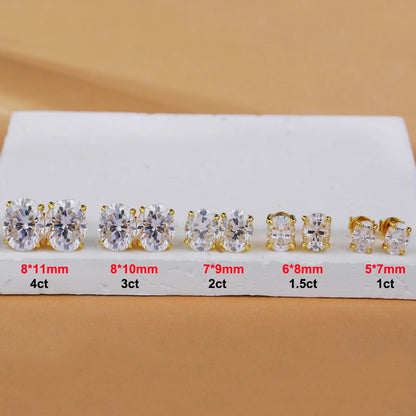 Set of diamond earrings with size labels on a beige background